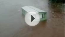 UK floods: Mobile home smashes into bridge in Aberdeenshire